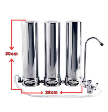 Three chrome water filter canisters in a row with a dedicated faucet on the right, showing overall height 30 cm and width 28 cm.
