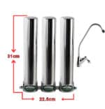 Three chrome water filter housings arranged in a row with a tall faucet on the right; overall height 31 cm and total width 22.5 cm.