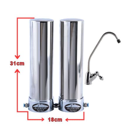 Dual chrome water filtration columns with a separate faucet, used for home drinking water; stands 31 cm tall and 18 cm wide.