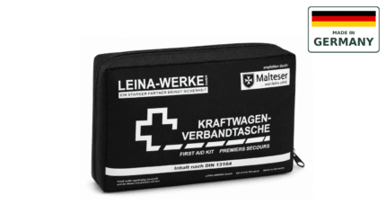 Black automotive first-aid kit with white branding and a zipper, labeled 'KRAFTWAGEN-VERBANDTASCHE'.