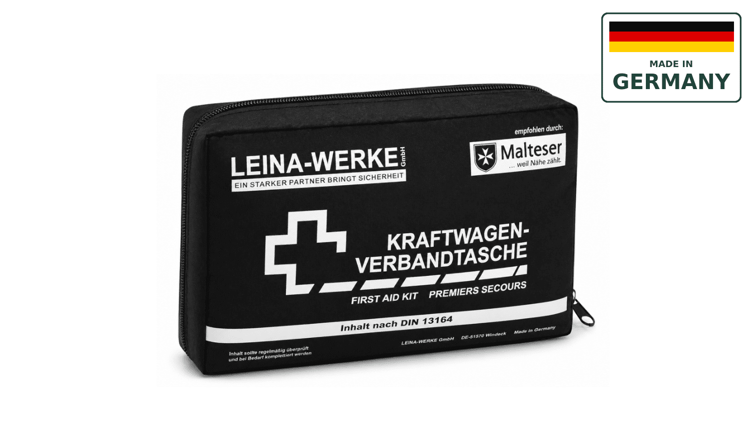 FARMAKIO_1 - Olympus Plus Black automotive first-aid kit with white branding and a zipper, labeled 'KRAFTWAGEN-VERBANDTASCHE'.