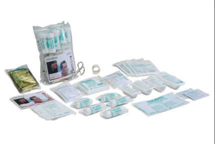 Comprehensive first aid kit with assorted sterile dressings, bandages, scissors, tape, and small pouches laid out on a white background.